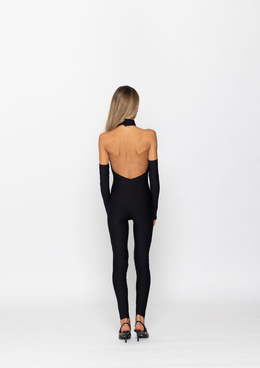 NOIRÉ – Open Back Jumpsuit
